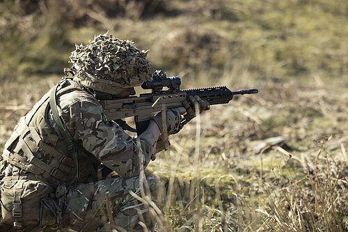 A soldier fires at a target Pictured: A soldier fires at a target during a Live Range serial whilst on the The Light Close Recognisance Commanders Course.
