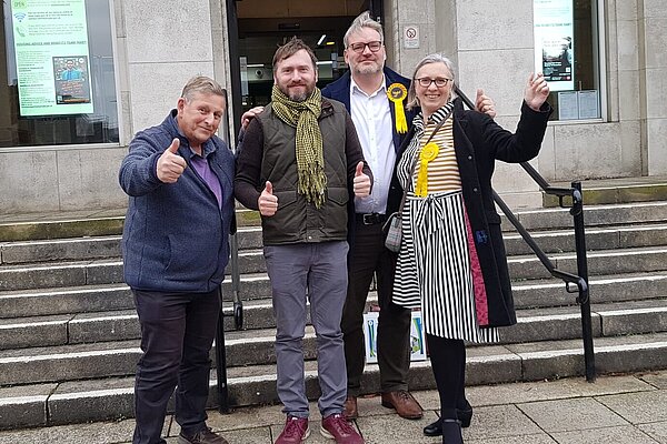 Jerry Roodhouse, Stephen Pimm, Jon Bennett and Jenny Wilkinson outside Benn Hall in Rugby after Jon's election victory in Dunsmore Ward of Rugby Burrough Council